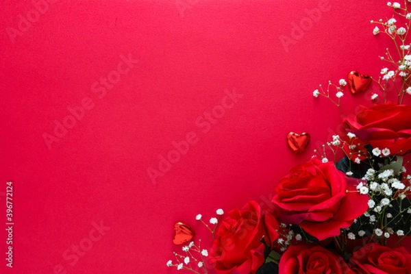 Fototapeta Valentine's day mock up with gypsophila, red ribbon and hearts isolated on red background. Copy space.