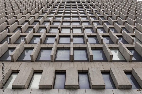 Fototapeta Looking up at a tall building with interesting patterned architecture in downtown Atlanta Georgia