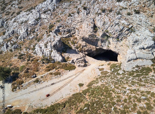 Fototapeta Aerial view of Ideon Antron Cave in Anogia village, Rethimno, Crete. It is believed to be the possible birthplace of Zeus in mythology.