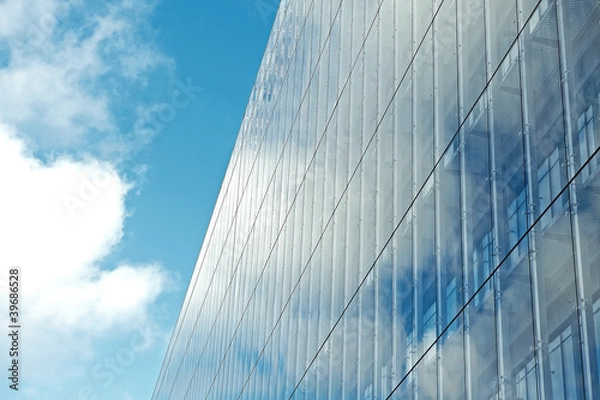 Fototapeta Office building reflecting the sky