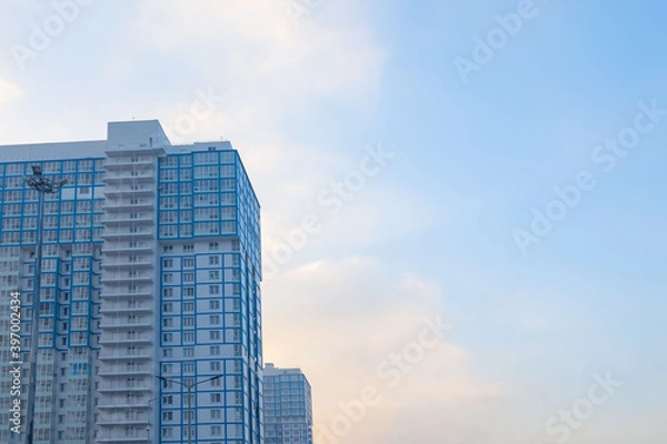 Obraz Background, modern houses against the sky, copy space