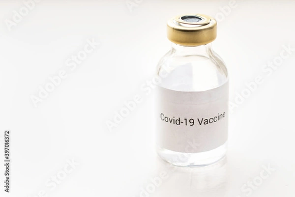 Fototapeta a vial with a medicine for the coronavirus, a vaccine for covid-19 with a syringe and needle