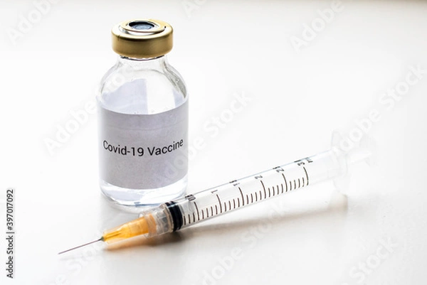 Fototapeta a vial with a medicine for the coronavirus, a vaccine for covid-19 with a syringe and needle