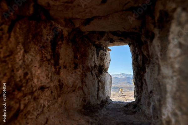 Fototapeta Biokovo mountain in Croatia photographed through the window of fortress