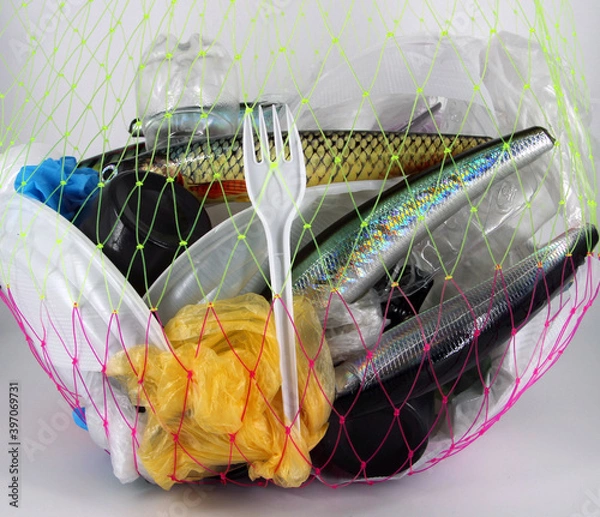 Fototapeta plastic fish, plastic trash in the net