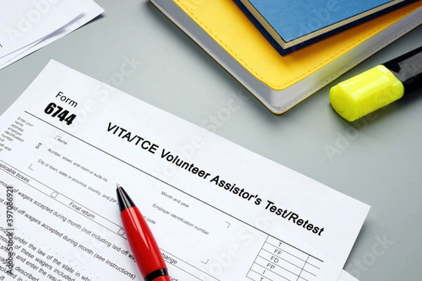 Fototapeta  Financial concept about Form 6744 VITA/TCE Volunteer Assistor's Test/Retest with phrase on the sheet.