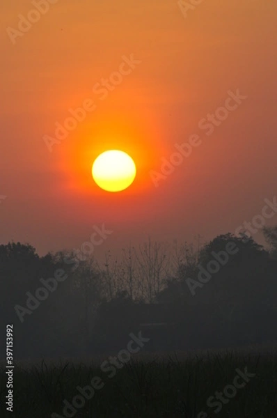 Fototapeta sunset over the mountains