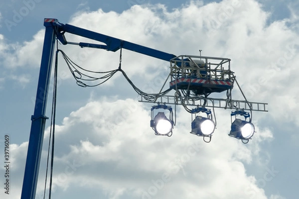 Fototapeta high powered spotlights illuminating a movie set