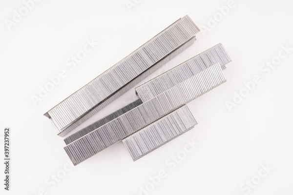 Obraz staples for construction stapler on white background