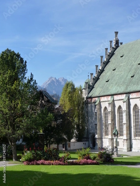 Fototapeta Sun shining on the east side of a old building 