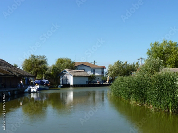 Fototapeta Water flowing along the city 