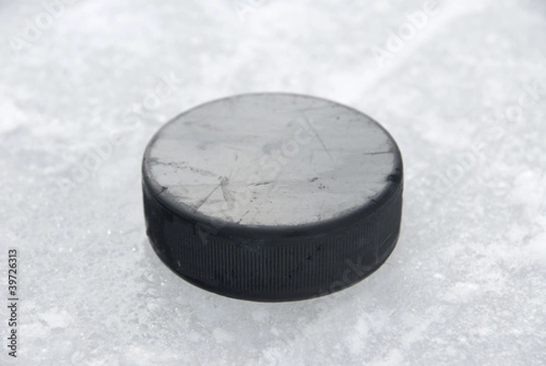Obraz hockey puck on ice