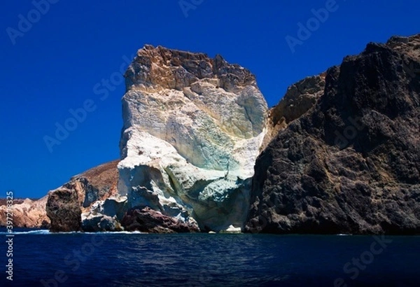 Fototapeta White beach and cliff on the island of Santorini in the archipelago of the Southern Cyclades in Greece.