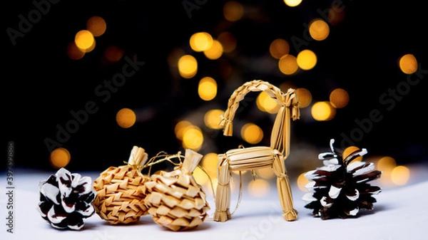 Fototapeta rustic christmas decoration card with garland and snowflakes, bokeh