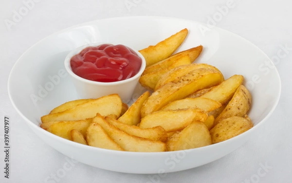 Obraz Fried potato slices with ketchup