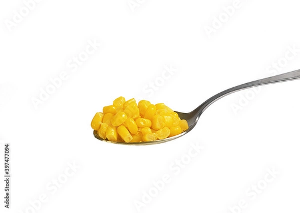Obraz tablespoon with canned corn on white background