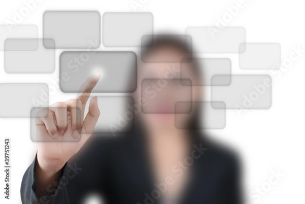 Fototapeta Business lady pushing button on the touch screen interface.