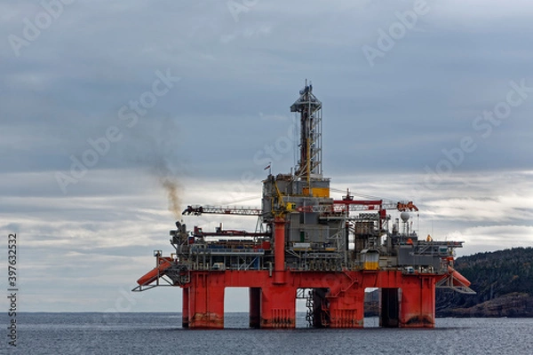 Fototapeta Deep water drill rig is moored near shore after finishing an exploration well, Newfoundland and Labrador, Canada.