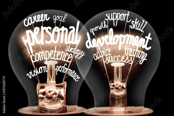 Fototapeta Light Bulbs with Personal Development Concept