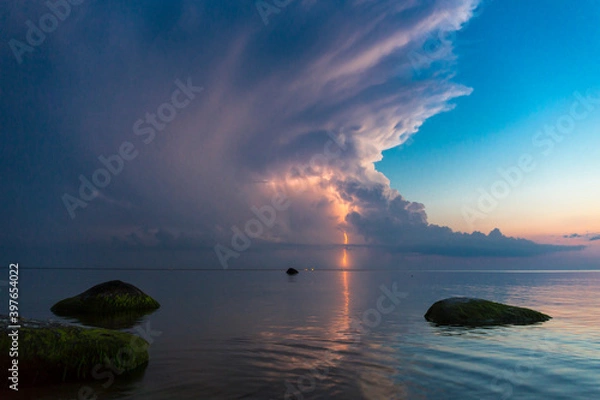 Fototapeta Beautiful scene with stormfront and lightning summer seascape.