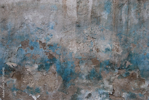 Fototapeta Old crumbled plastered wall faded paint as background
