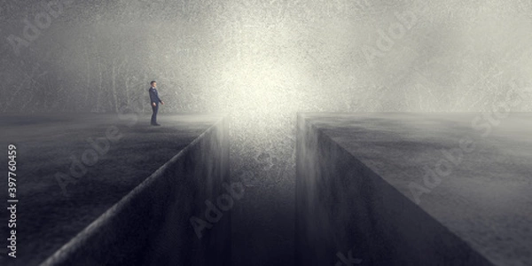 Fototapeta Businessman standing in front of precipice or a gap