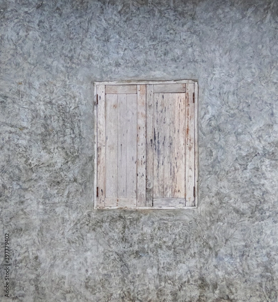 Obraz Gray plaster wall with old vintage window