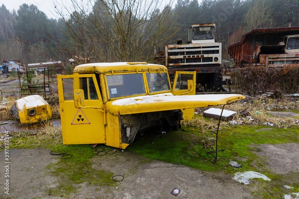 Obraz Cab of a truck that took part in the liquidation of the Chernobyl accident on the territory of the former vehicle fleet of the abandoned city of pripyat