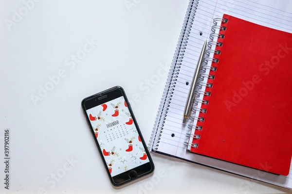 Fototapeta red notebook and pen
