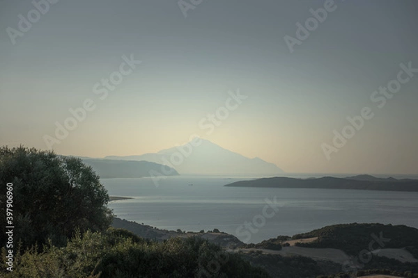 Fototapeta Holy Mount Athos from a distance in summer haze 