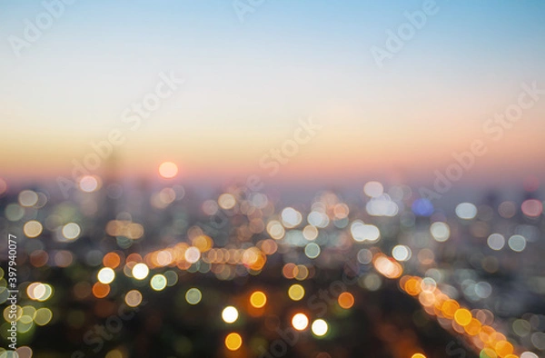 Obraz Bokeh light and blur city skyline sunrise background. Bangkok, Thailand, Asia