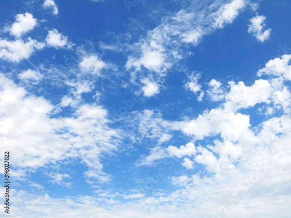 Fototapeta Cloudy sky. White clouds in a blue sky. Blue sky with clouds. 