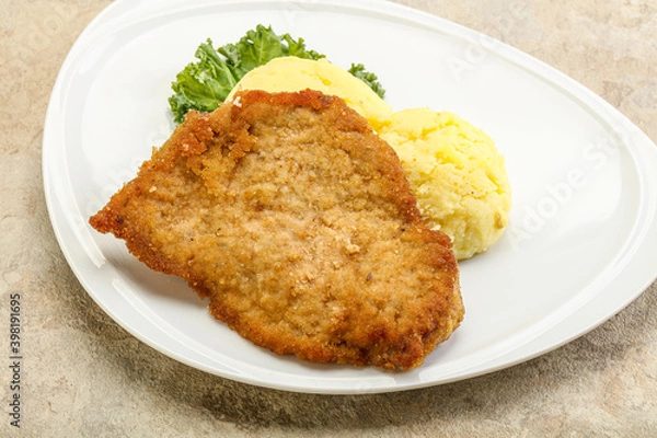 Obraz Crispy chicken schnitzel with mashed potato
