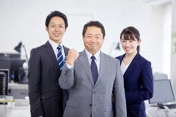 Fototapeta ガッツポーズする上司と部下