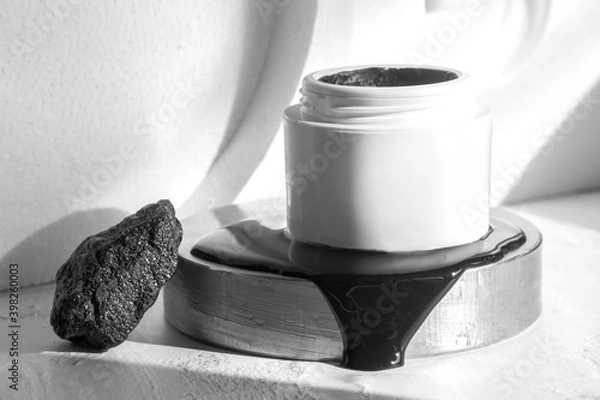 Fototapeta black mask with crub by activated charcoal powder and caviar