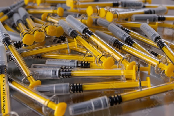 Fototapeta Large group of vaccine syringes