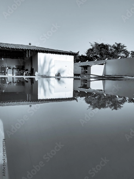 Obraz reflection of a house in the water