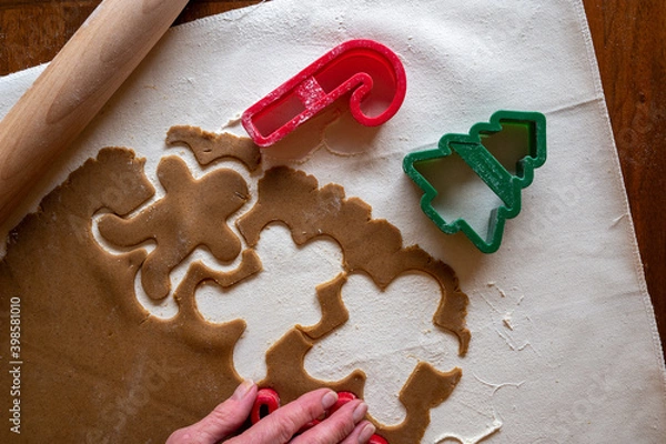 Obraz Gingerbread cookie dough cut out flat lay