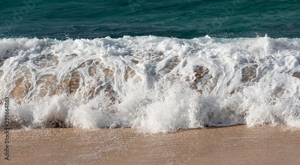 Fototapeta Waves breaking on the beach