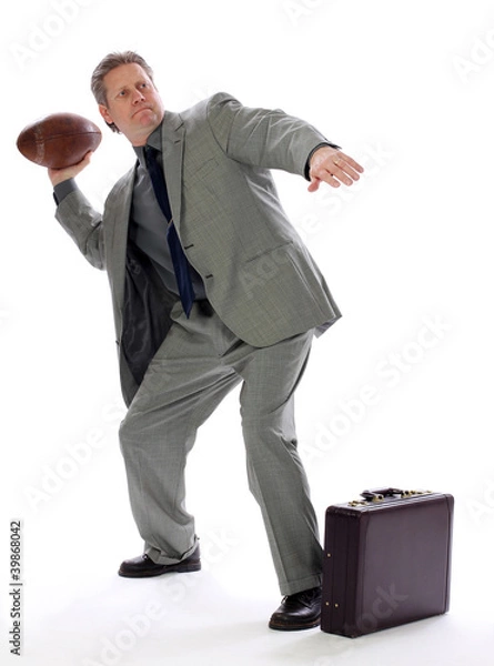 Fototapeta Business Man Throws a Football