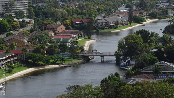 Fototapeta View of city with river and bridge