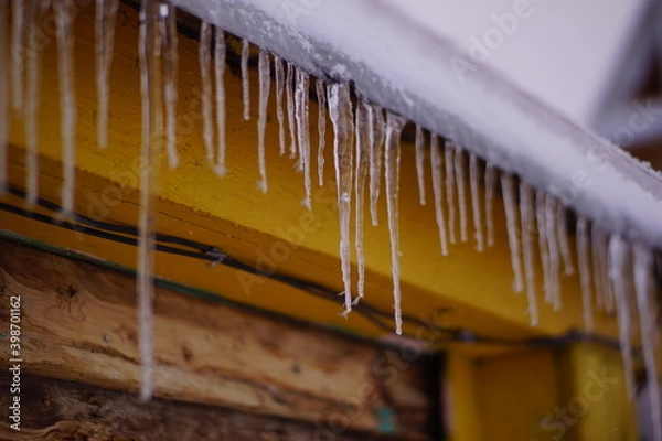 Fototapeta icicles on a white background