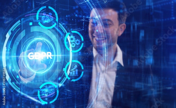 Fototapeta Business, Technology, Internet and network concept. Young businessman working on a virtual screen of the future and sees the inscription: GDPR
