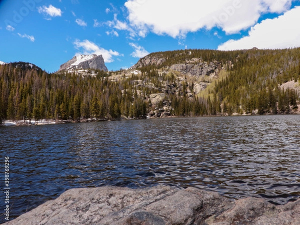 Obraz A Winter Day Hike Through The Mountains 