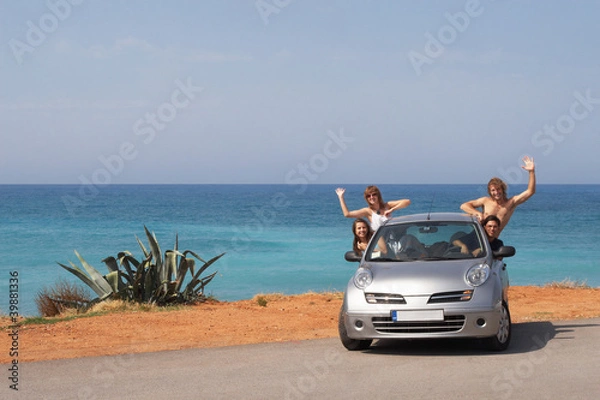 Obraz Towarzystwo młodych ludzi podróżujących samochodem