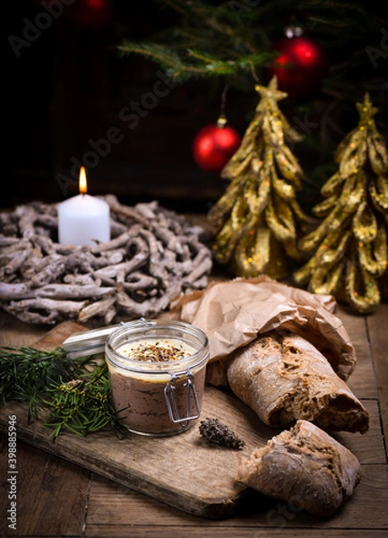 Fototapeta Homemade liver pate in glass jars on rustic festive/christmas table with sourdough bread
