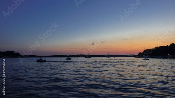 Fototapeta Sunset on Hvar Island Croatia with boats