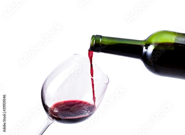 Fototapeta red wine pouring in the glass