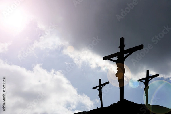 Fototapeta three crosses beneath stormclouds