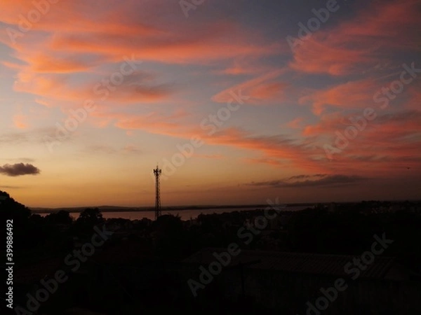 Obraz sunset and clouds in the city
